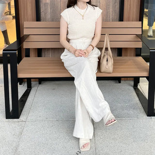 Sleeveless mock neck knit