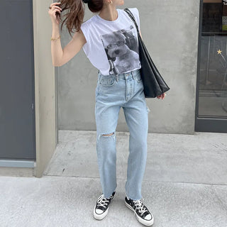 Distressed denim pants