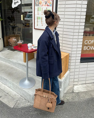 Double-breasted quilted coat