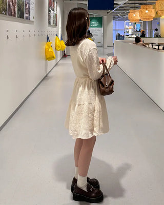 Shirred dress with strings