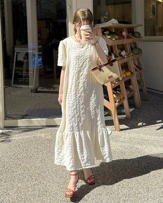 Long dress with ruffled hem