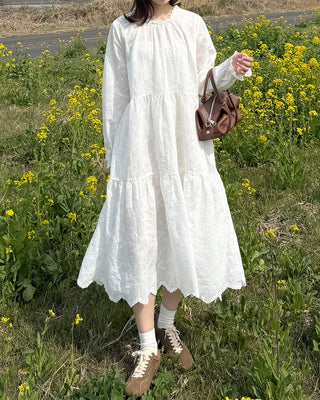 Long dress with neck lace detail and ruffles