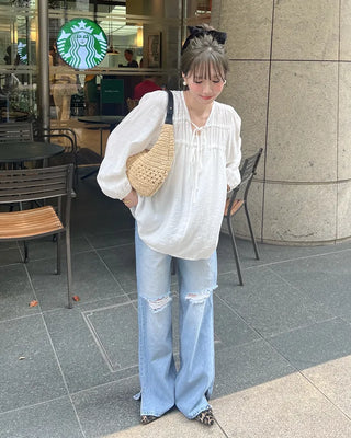 Distressed wide-fit denim pants