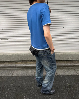 Oil-washed flared denim pants
