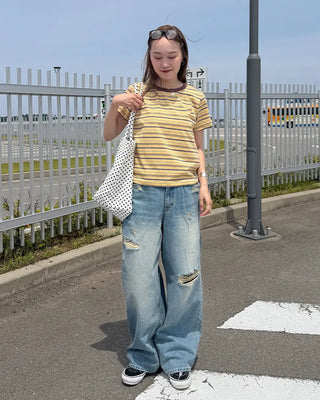 Distressed wide-fit denim pants