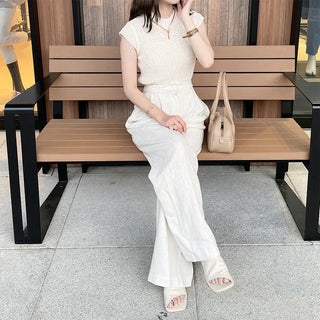 Sleeveless mock neck knit