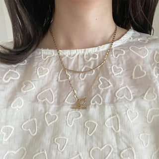 Round motif toggle clasp necklace
