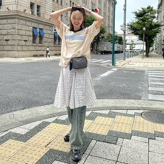 Pleated check midi skirt