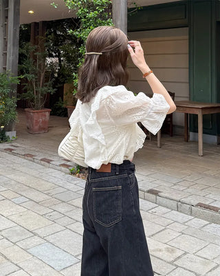 Punched ruffle blouse