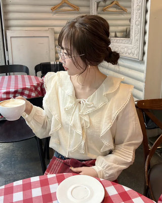 Frilled ribbon blouse
