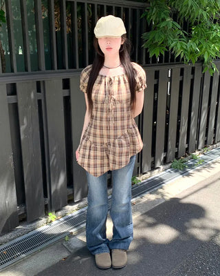 Low-waist point-washed flare jeans