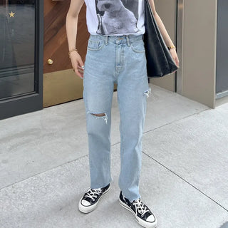 Distressed denim pants