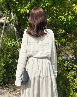 Loose-fitting sheer knit