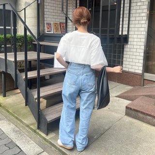 Distressed straight denim pants