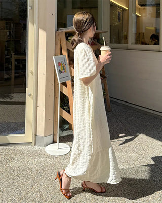 Long dress with ruffled hem