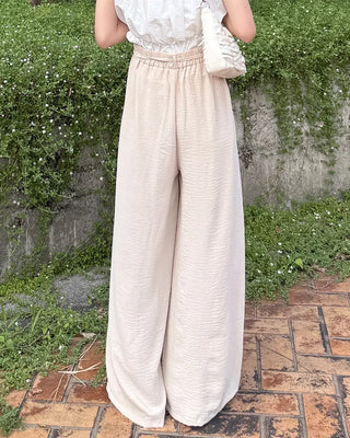 Two-button strap slacks