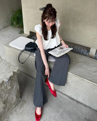 High-waisted, two-pleat, button-down wide-leg trousers
