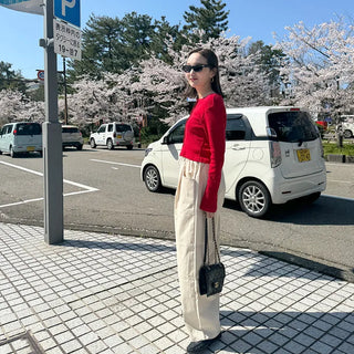 Round punching cardigan