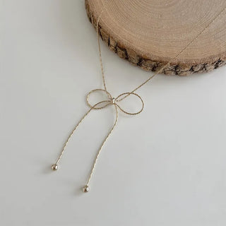Ribbon motif necklace