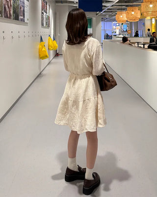 Shirred dress with strings