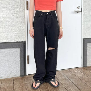 Distressed black denim pants
