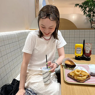 Heart-punched short-sleeved T-shirt