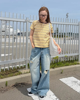 Distressed wide-fit denim pants