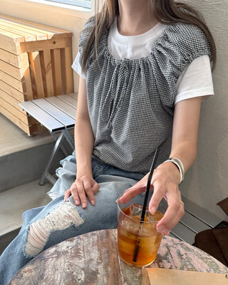 String sleeveless blouse