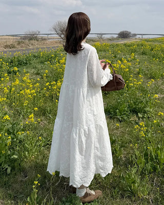 Long dress with neck lace detail and ruffles