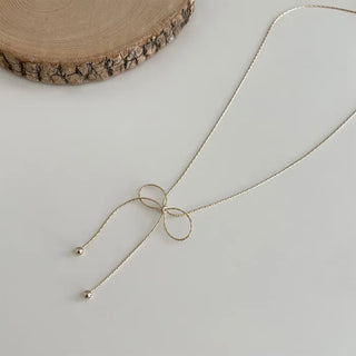 Ribbon motif necklace