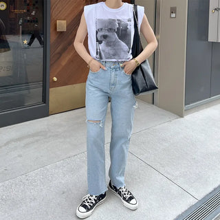 Distressed denim pants