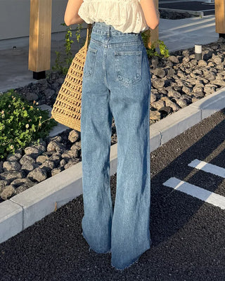 High-waisted denim pants with button strings