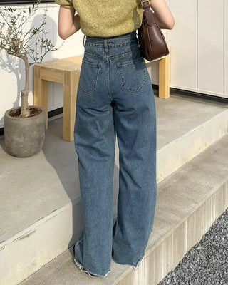 Strap high-waisted denim pants