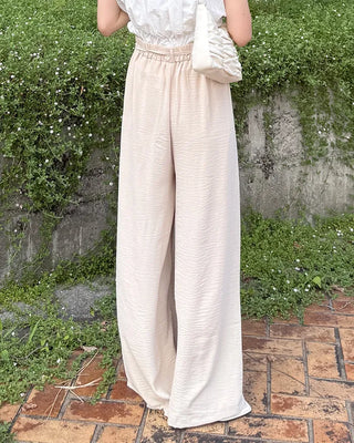 Two-button strap slacks