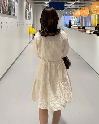 Shirred dress with strings