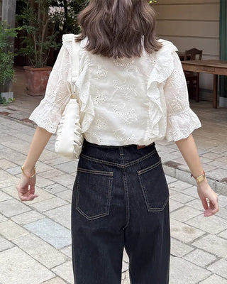 Punched ruffle blouse