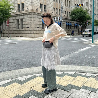Pleated check midi skirt