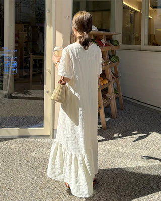 Long dress with ruffled hem