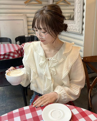 Frilled ribbon blouse