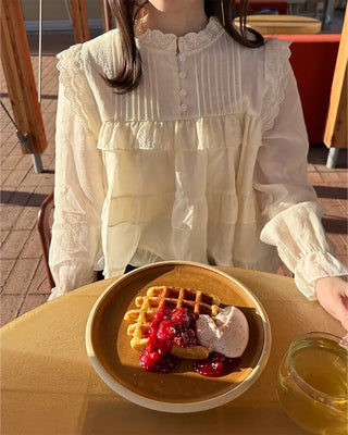 Tiered ruffle blouse