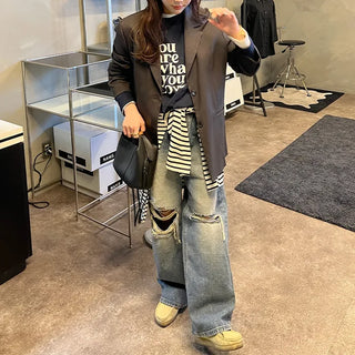 Knee-ripped denim pants
