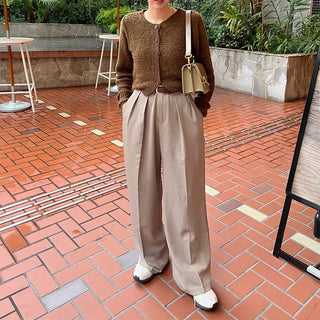 Belted pleated slacks