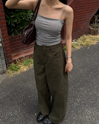 Side-tucked white cotton pants