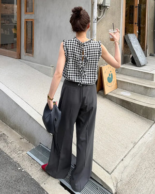 High-waisted, two-pleat, button-down wide-leg trousers
