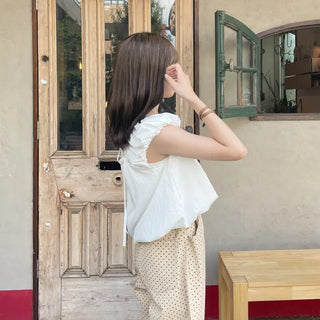 Back ribbon shirred blouse