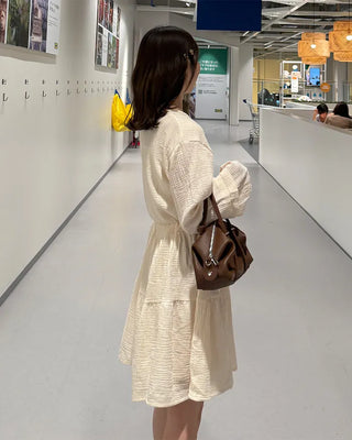 Shirred dress with strings