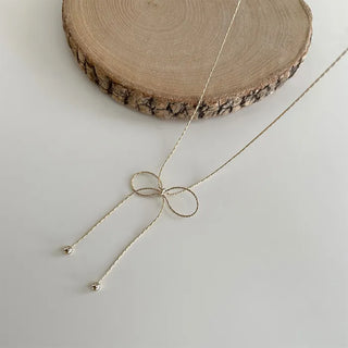 Ribbon motif necklace