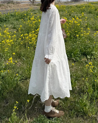 Long dress with neck lace detail and ruffles