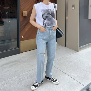 Distressed denim pants