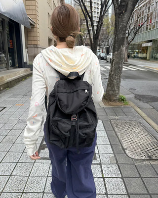 Square pocket nylon backpack